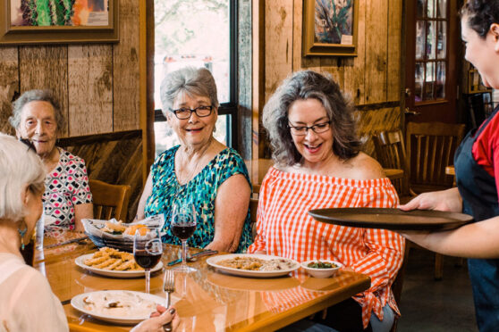 Woman eating at Cafe at the Ridge