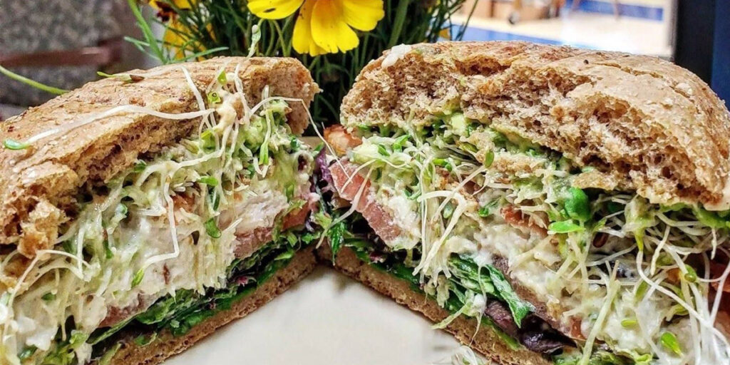 Sandwich stuffed with meats and vegatables