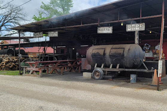 BBQ Smokers behind building