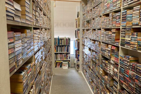 Books to Share shelves with books