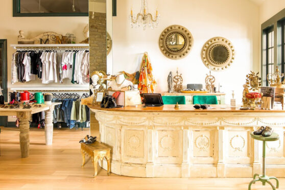 Boutique M counter with apparel and accessories