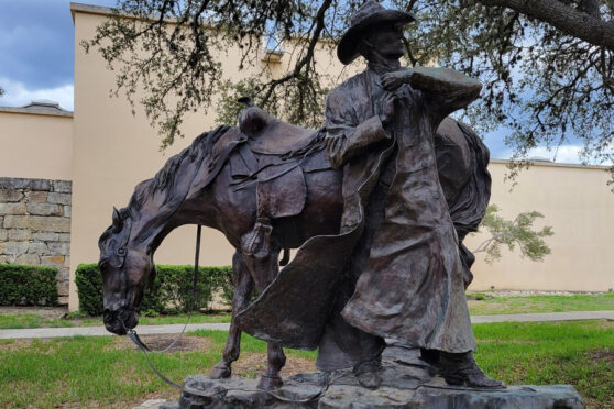 Bronze statue of horse and rider