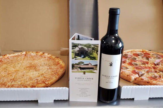 Pizza and wine from Carmine’s Italian Restaurant