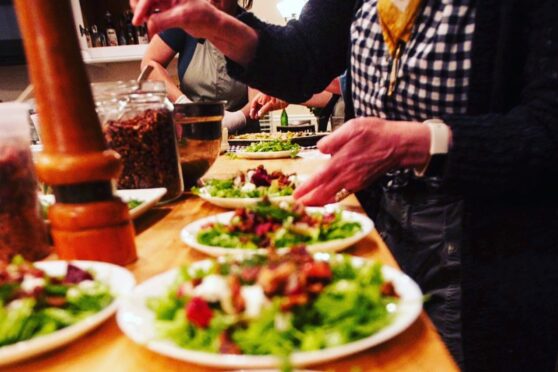 Central Provisions potluck plates at table