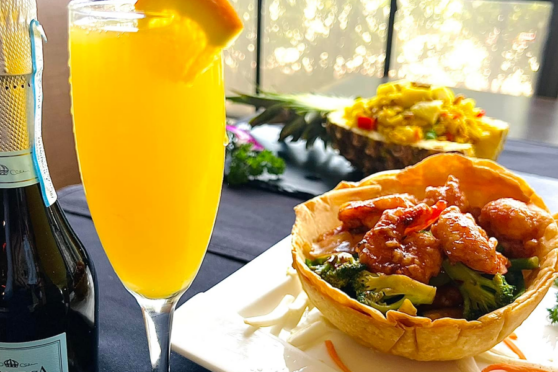 Chinatown-entree with orange juice and Orange Chicken