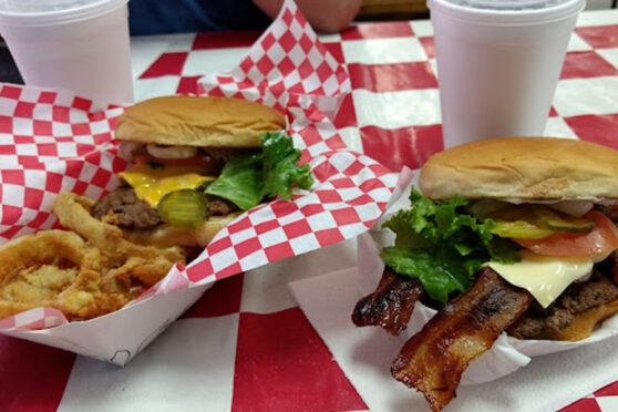 Two hamburgers and drinks