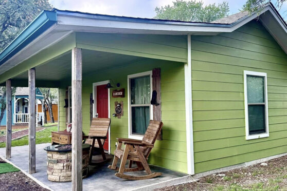 Cabin with outdoor rocking chairs