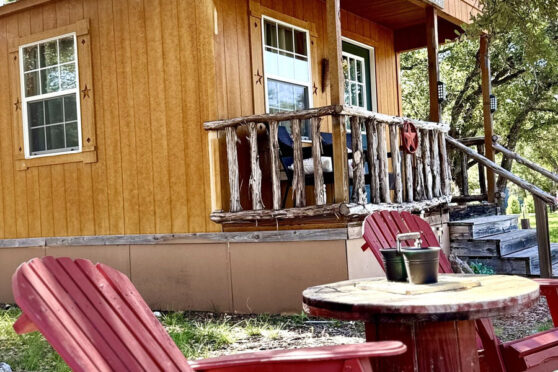 rustic cabin with outdoor seating
