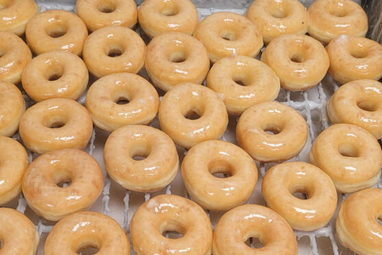 Donuts being glazed