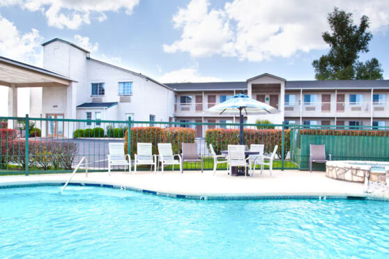 swimming pool at Days Inn by Wyndham Kerrville pool area