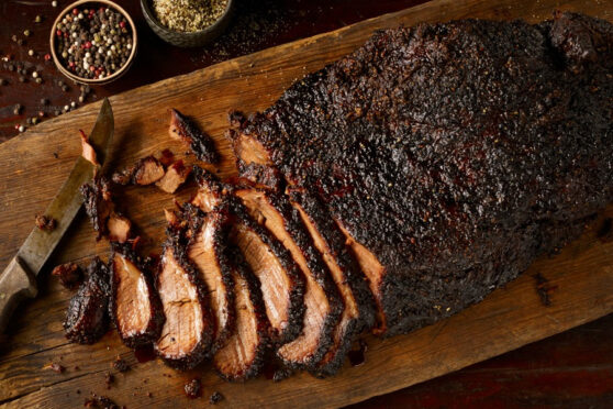 Dickeys Barbeque Pit Brisket on a cutting board