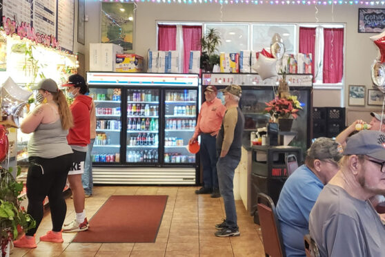 Donut Palace interior with customers
