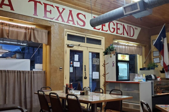 Hill Country Cafe Texas Legend sign and dining area