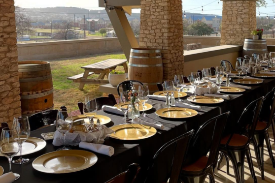 Dining table settings for an event at Kerrville Hills Winery