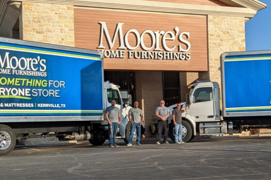 Moore's Home Furnishings store with trucks