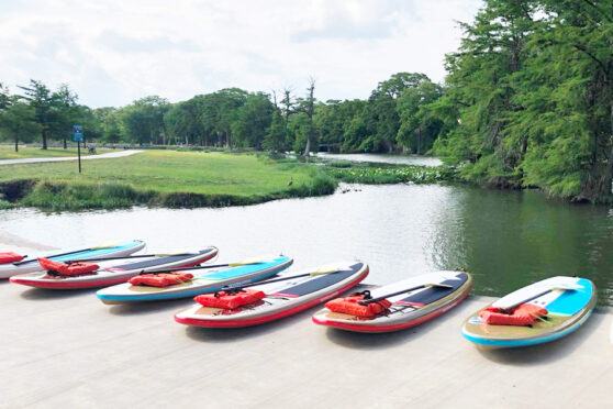 Paddle boards near river