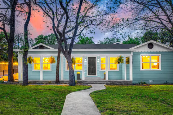 The Stardust home with tree and yard
