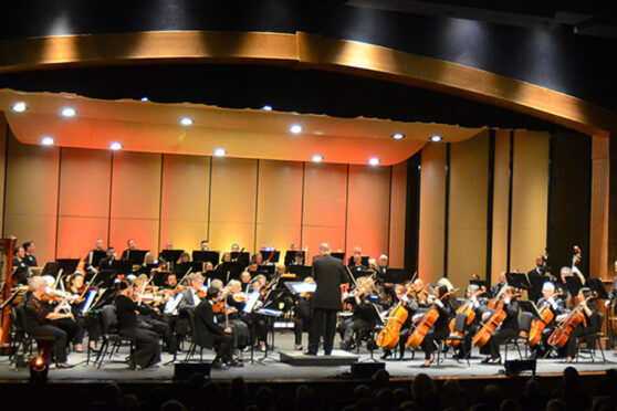 Symphony of the Hills Orchestra on stage