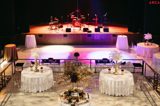 The Arcadia Live Event set up with table and chairs