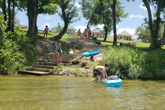 Tubers on stairs at river access
