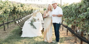 A couple standing in Turtle Creek Olive Grove