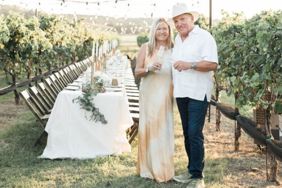 A couple standing in Turtle Creek Olive Grove