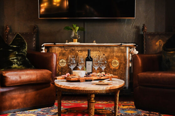 Turtle Creek Olives and Vines sitting area with wine and appetizers