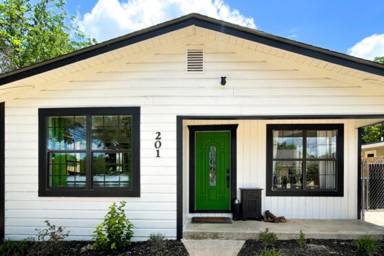 Black and white home from WELL-TENDED LIFE PROPERTIES