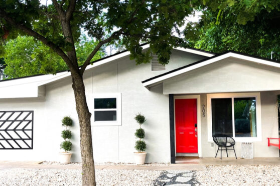 Home with red door from WELL-TENDED LIFE PROPERTIES
