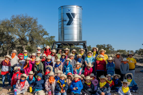 YMCA Roberts Ranch campers in front of water tower