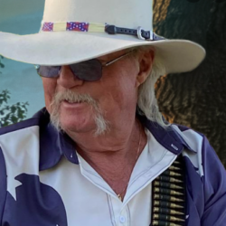 Bob Stewart with hat and glasses