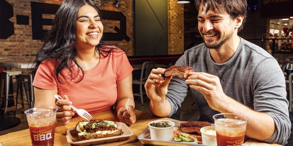 Couple eating BBQ -Photo Credit: True Texas BBQ