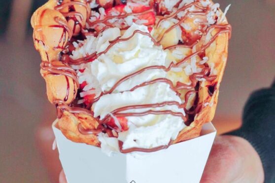 Bubble waffle with toppings and whipped cream