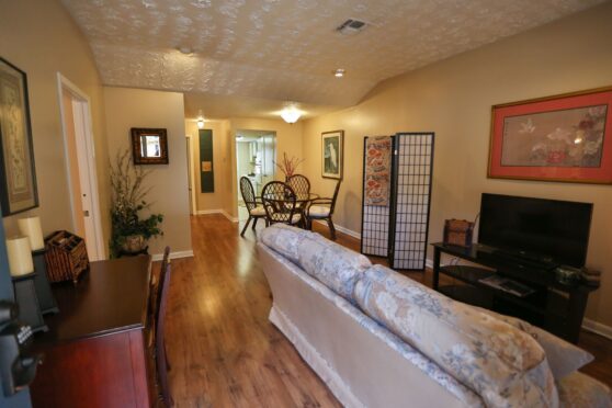 Living area with a couch at Carlton Club Inn