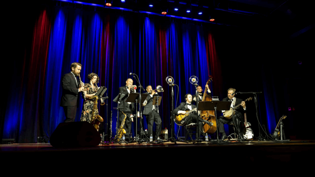 Musicians performing on stage at Arcadia Live Theatre