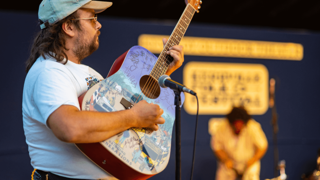 Guitarist on stage at Folklife Festival