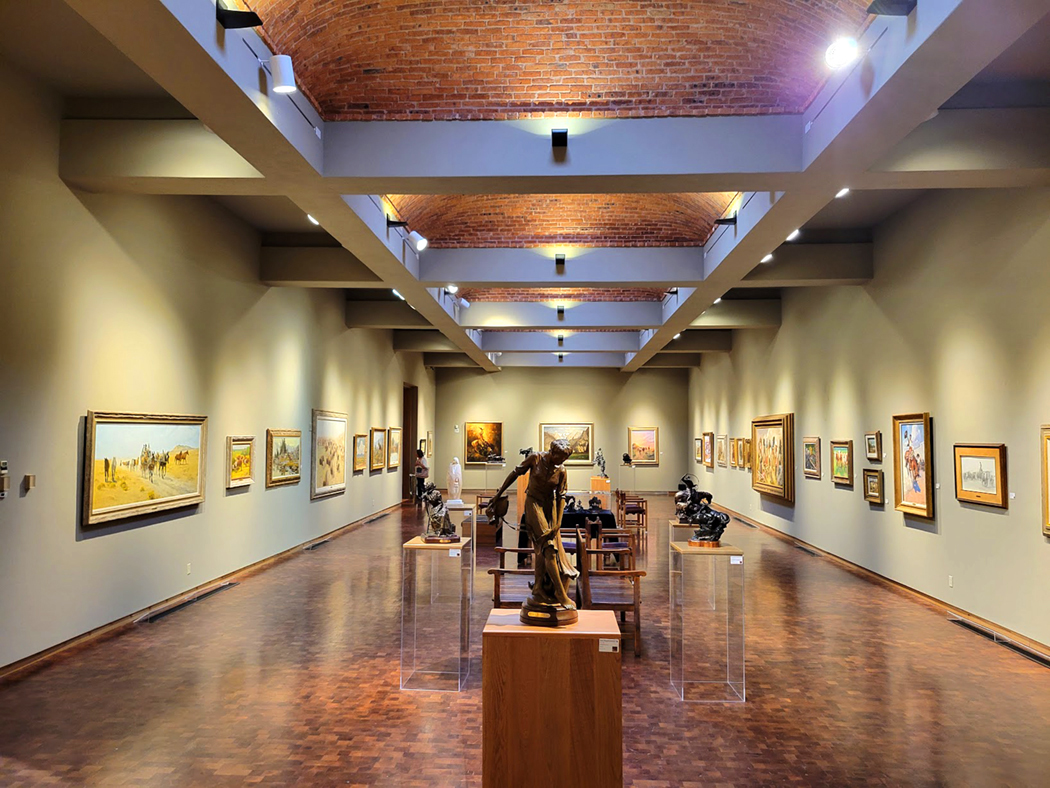 Statues and artwork lining the halls of the Museum of Western Art in Kerrville