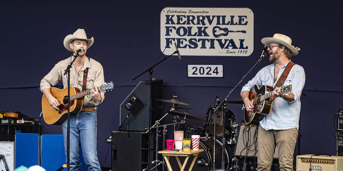 Two guitar players on stage