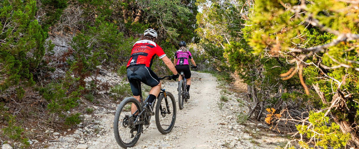 Two mountain bikers on trail