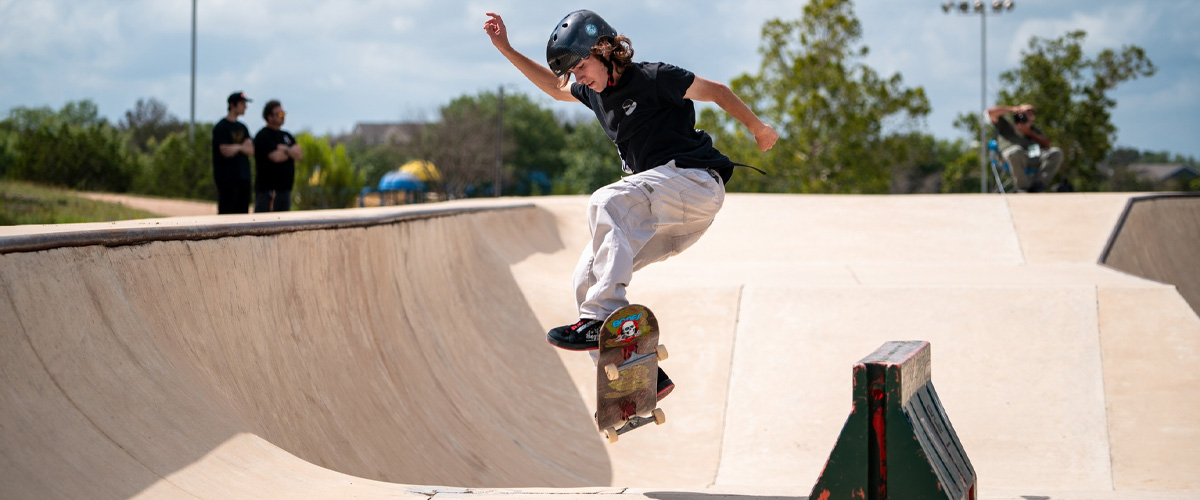 kid skateboarding in park