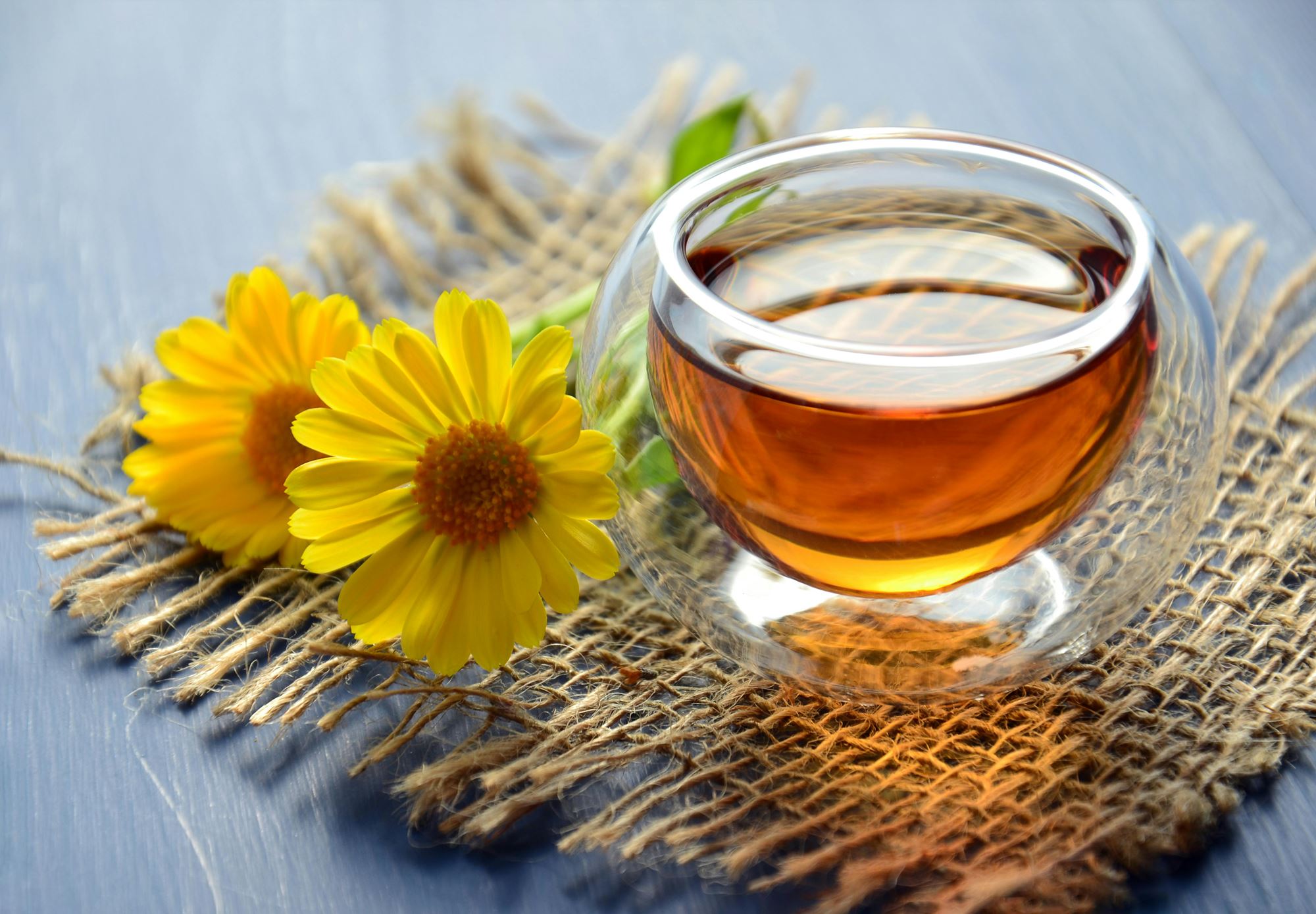 Glass of tea with flower