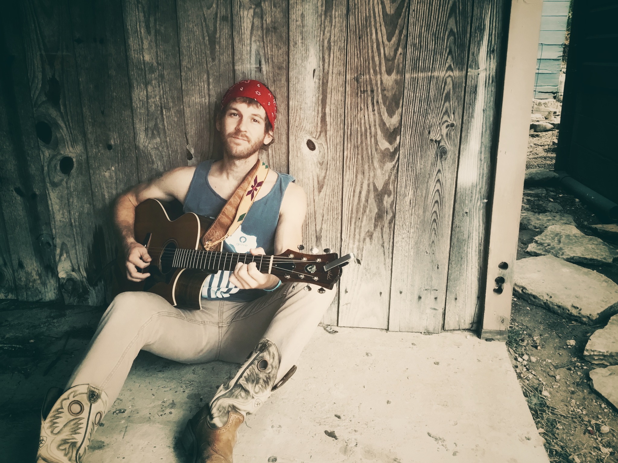 Boone Holding Boone Holding playing guitar