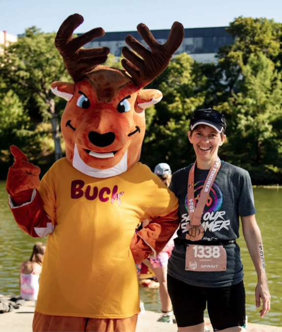 marathon runner with mascot
