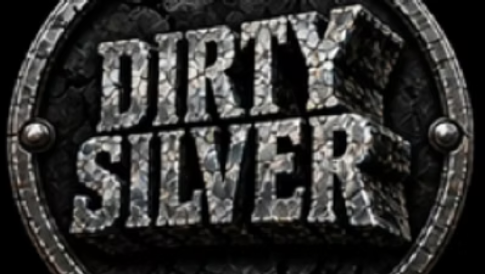 Promotional graphic for live music by Dirty Silver, featuring the band's name in a metallic, textured font inside a circular metal frame.