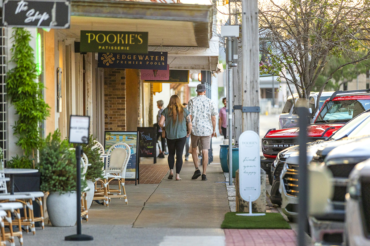 Couple walking downtown in Kerrville